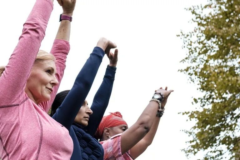 Photo of three women exercising