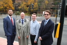 At the new crossing on St Cloud Way, left to right, Steve Kueberuwa, Construction Manager at VolkerHighways, Councillor Geoff Hill, Cabinet Member for Highways and Transport, Councillor Joshua Reynolds, Cabinet Member for Communities and Leisure, and Tim Golabek, Service Lead for Transport at the Royal Borough of Windsor & Maidenhead.